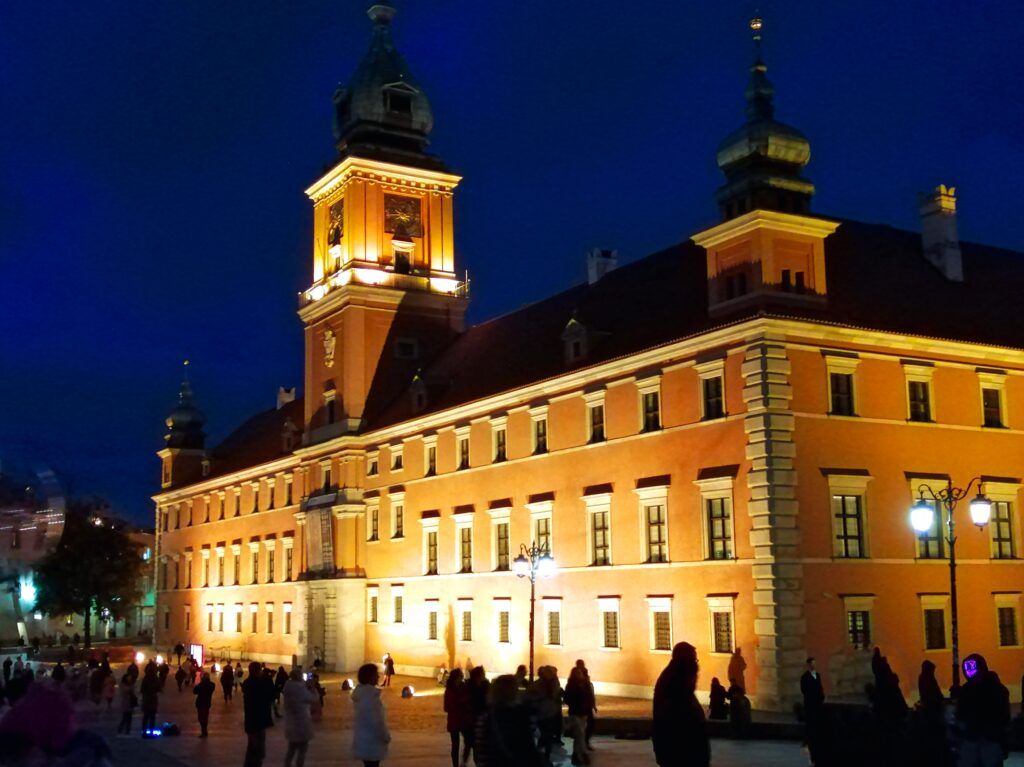 the Royal Castle at night during the weekend trip to the capital city of Poland