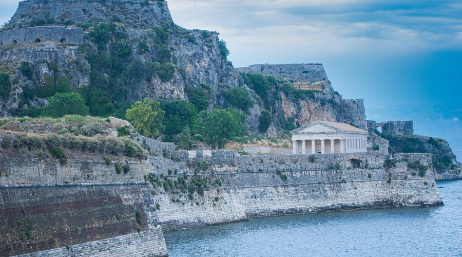 the monumental Old Fortress with the lighthouse in the city of Kerkyra during holidays on Corfu